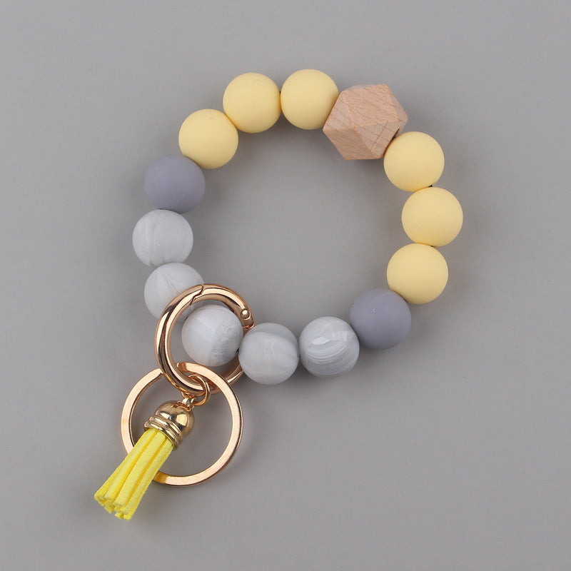 Llavero de muñeca con cuentas de silicona al por mayor